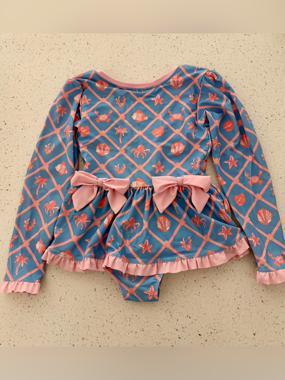RuffleButts Long-Sleeve Sea Life Peplum Swimsuit in Blue and Pink
